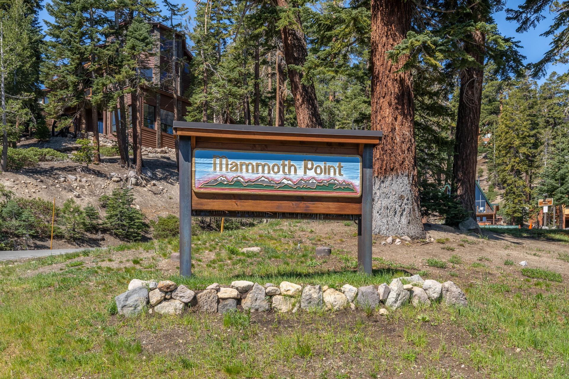94 John Muir Road, Unit 132 Mammoth Lakes, CA 93546 - Photo 1 of 58 a sign that is sitting on a brick wall