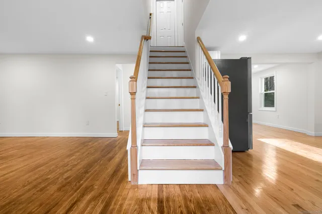 a view of entryway with wooden floor
