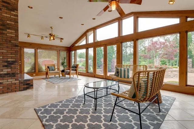 a view of a living room and dining room
