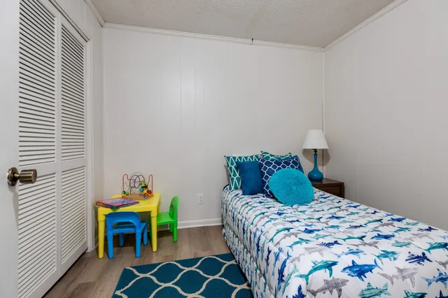 a house with swimming pool in front of it