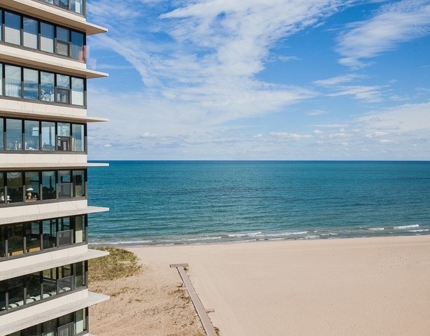 5757 North Sheridan Road, Unit 9C Chicago, IL 60660 - Photo 7 of 25 a view of a swimming pool with an ocean view