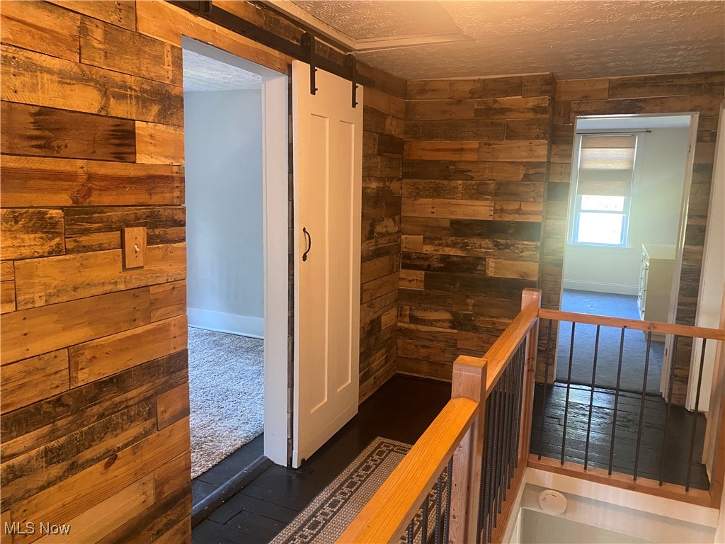 3016 Wadsworth Road Norton, OH 44203 - Photo 27 of 50 Second floor landing with ship lap walls