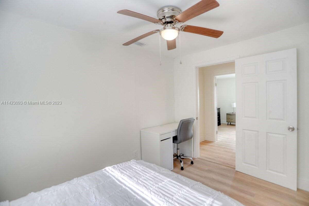 3632 Thomas Avenue Miami, FL 33133 - Photo 10 of 20 a view of a room with a workspace