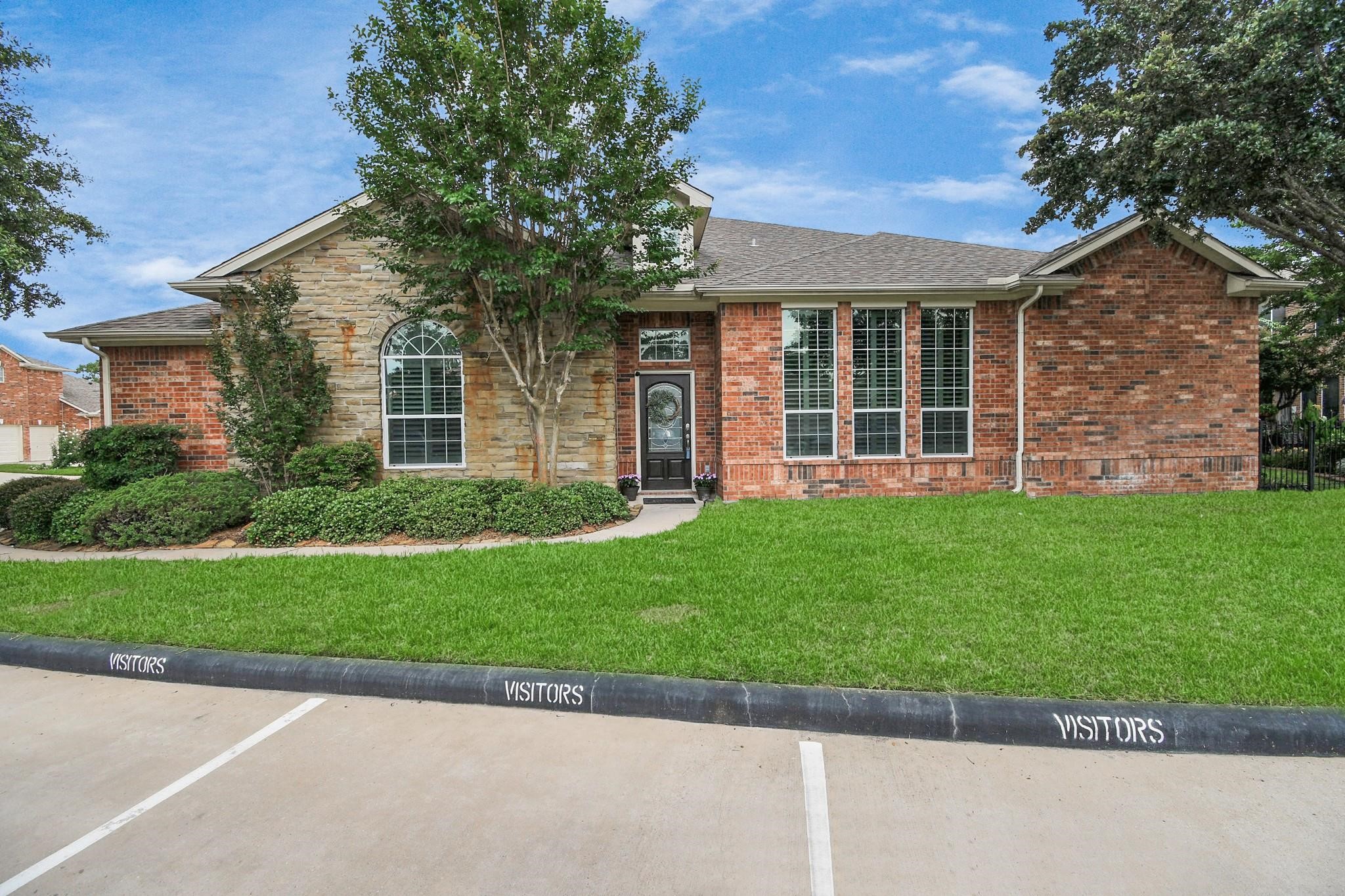8624 Sunset Loch Drive Spring, TX 77379 - Photo 36 of 44 front view of a house with a yard