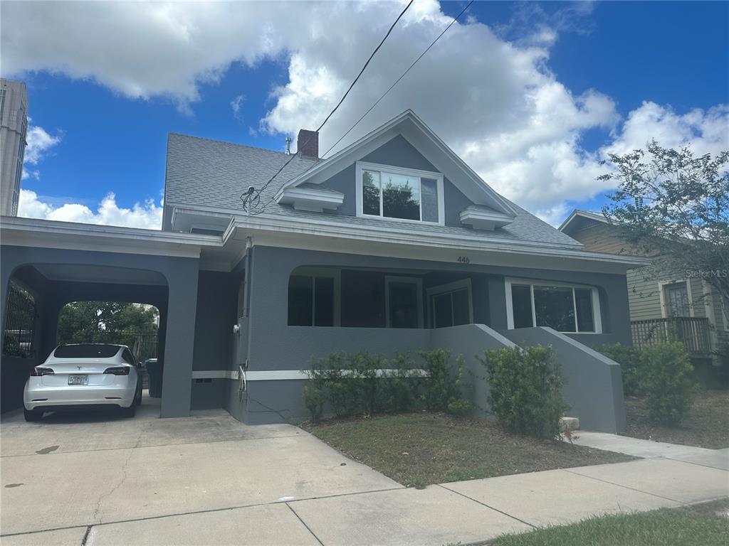 446 Ruth Lane Orlando, FL 32801 - Photo 2 of 45 a front view of a house with a yard