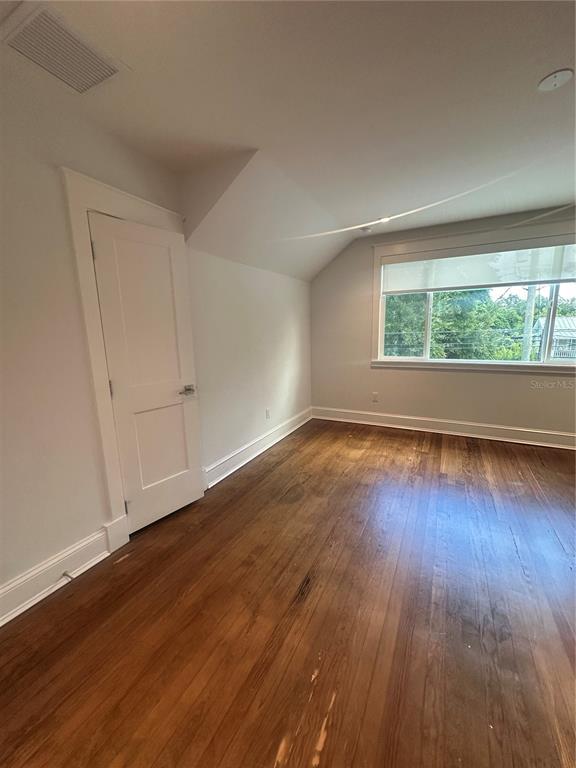 446 Ruth Lane Orlando, FL 32801 - Photo 21 of 45 a view of wooden floor and windows in a room