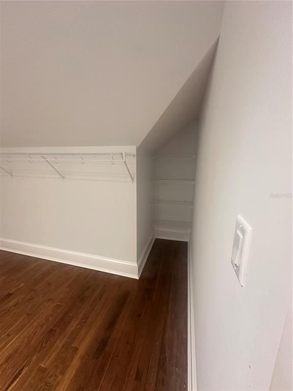 446 Ruth Lane Orlando, FL 32801 - Photo 24 of 45 an empty room with wooden floor