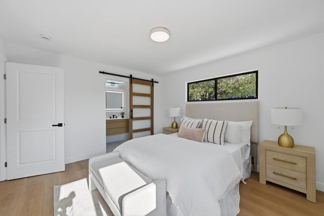 a bathroom with a sink toilet and mirror