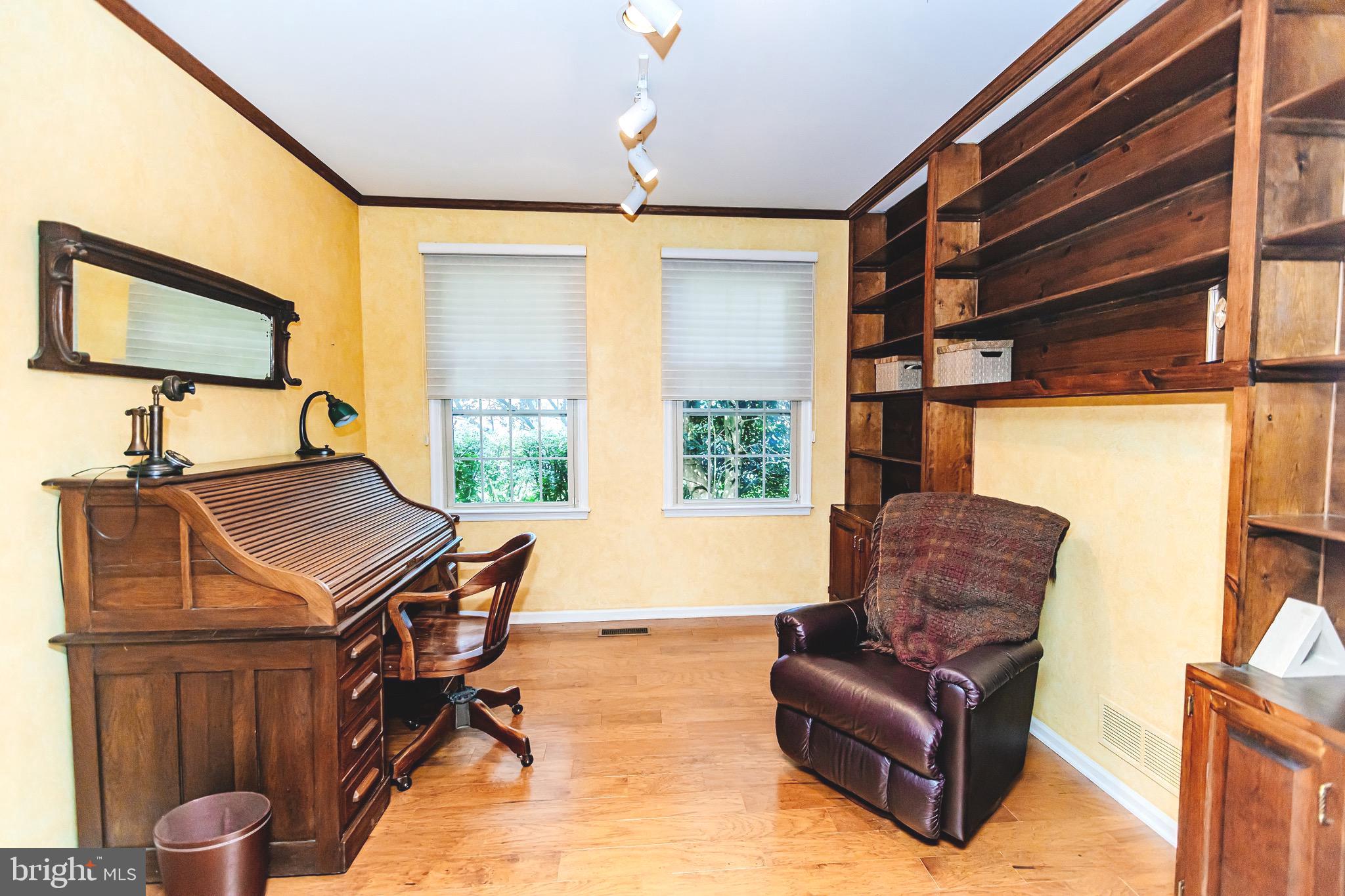 680 Fox Hollow Drive Yardley, PA 19067 - Photo 19 of 63 a living room with furniture a flat screen tv and a window