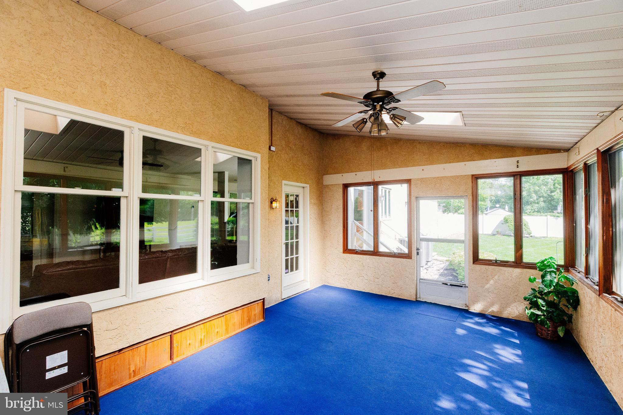 680 Fox Hollow Drive Yardley, PA 19067 - Photo 21 of 63 a view of an empty room with a window and wooden floor