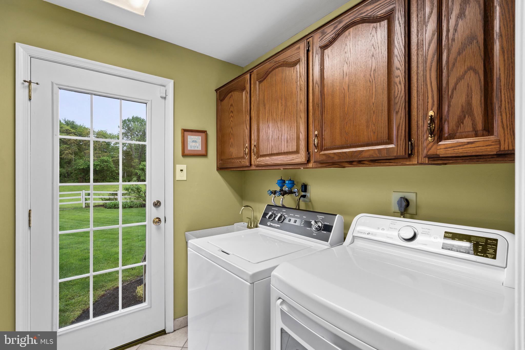 680 Fox Hollow Drive Yardley, PA 19067 - Photo 23 of 63 a utility room with dryer and washer