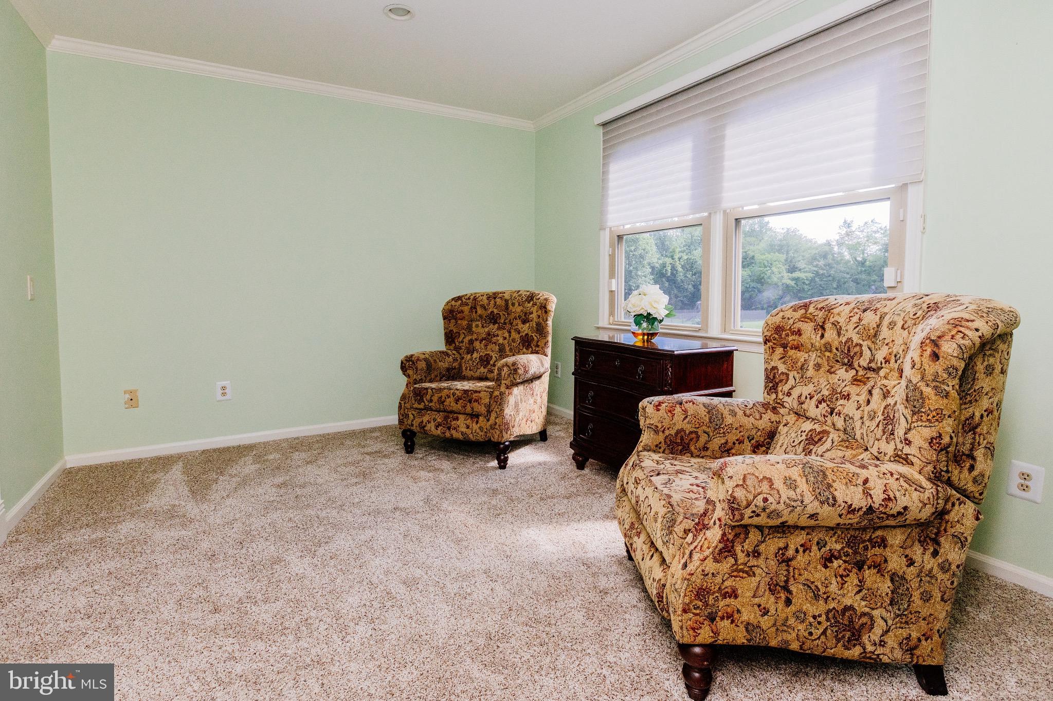 680 Fox Hollow Drive Yardley, PA 19067 - Photo 29 of 63 a living room with furniture and a large window