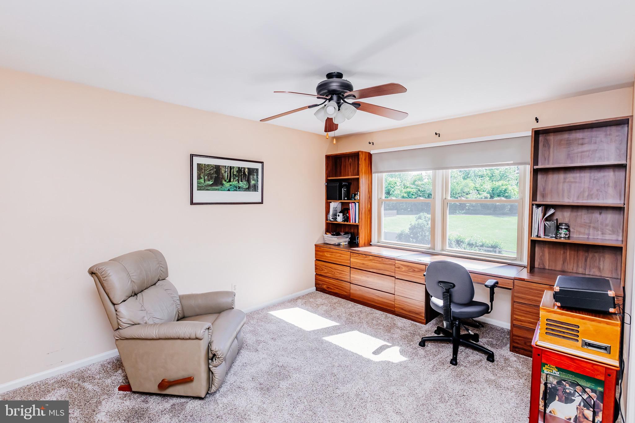680 Fox Hollow Drive Yardley, PA 19067 - Photo 39 of 63 a living room with furniture and a window