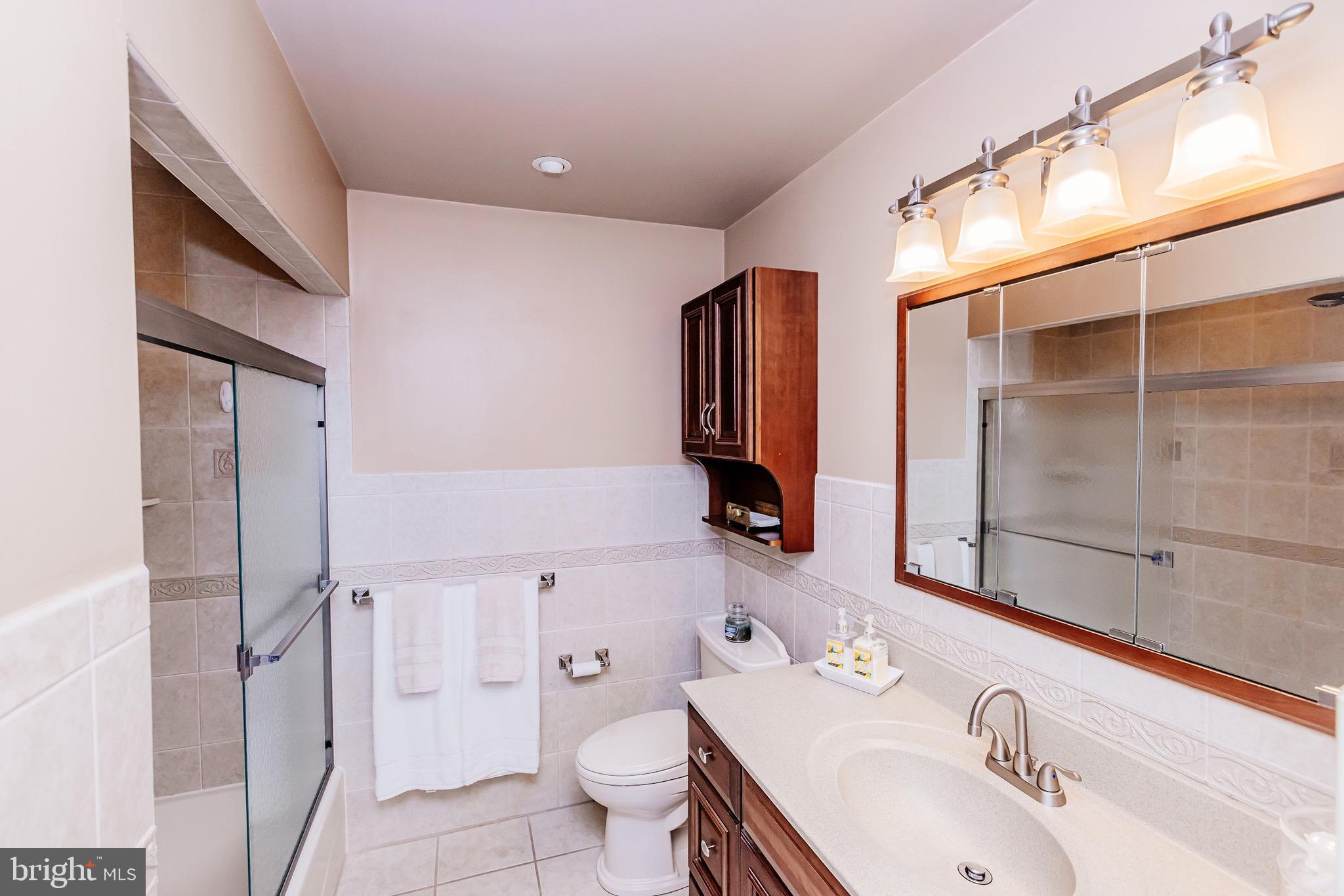 680 Fox Hollow Drive Yardley, PA 19067 - Photo 41 of 63 a bathroom with a sink toilet and shower