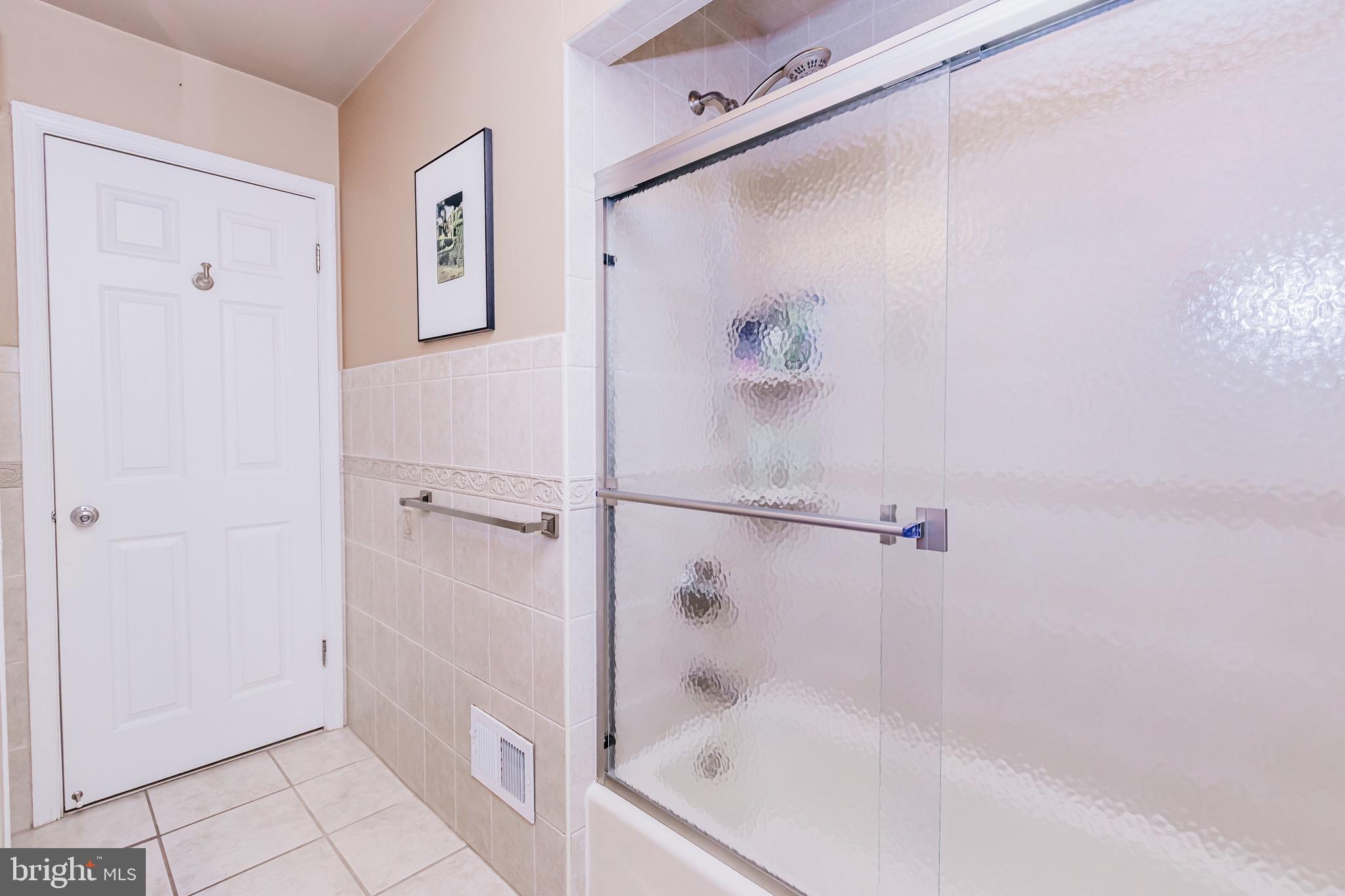 680 Fox Hollow Drive Yardley, PA 19067 - Photo 42 of 63 a bathroom with a bathtub