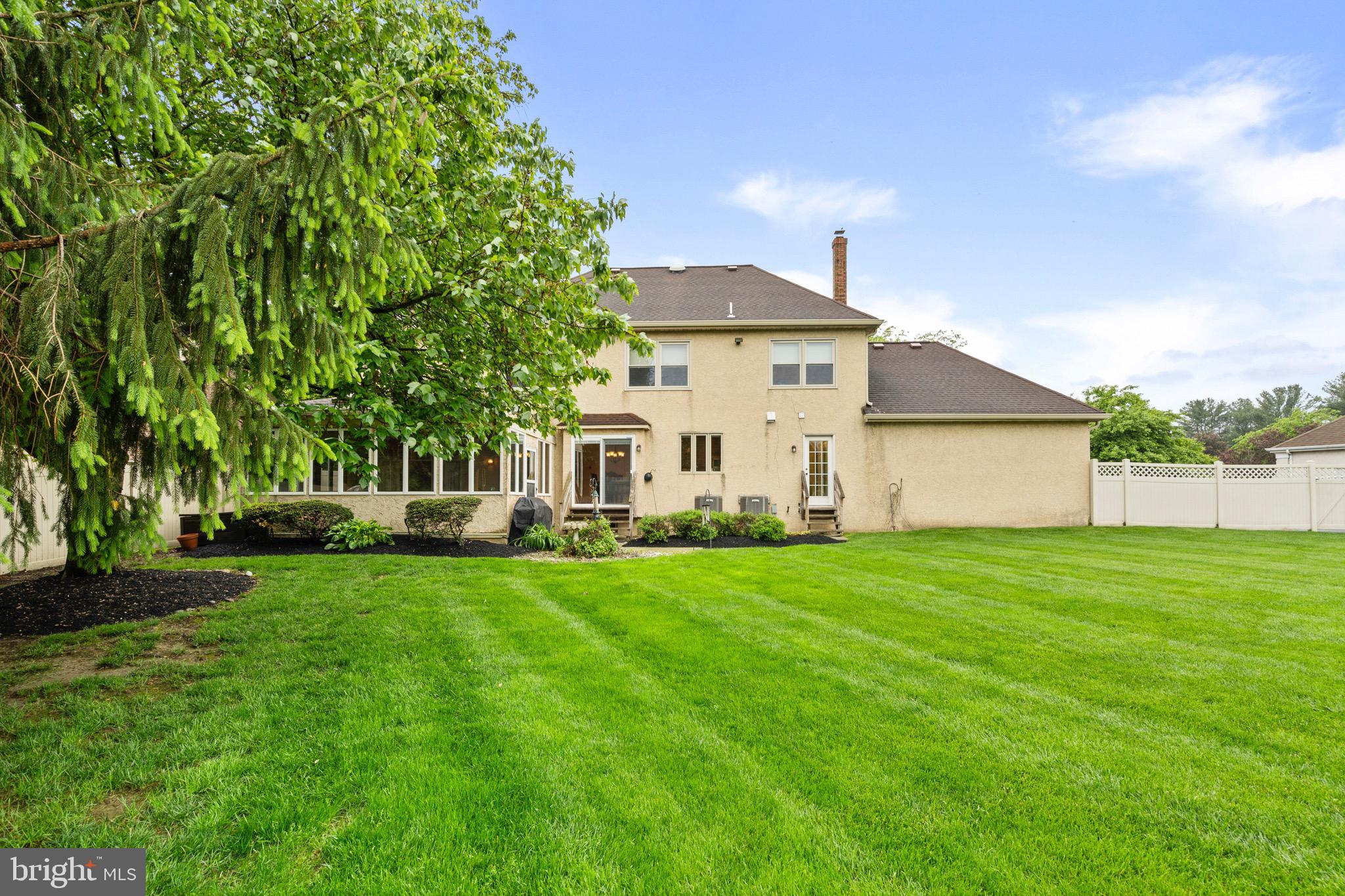 680 Fox Hollow Drive Yardley, PA 19067 - Photo 49 of 63 a view of a house with a yard
