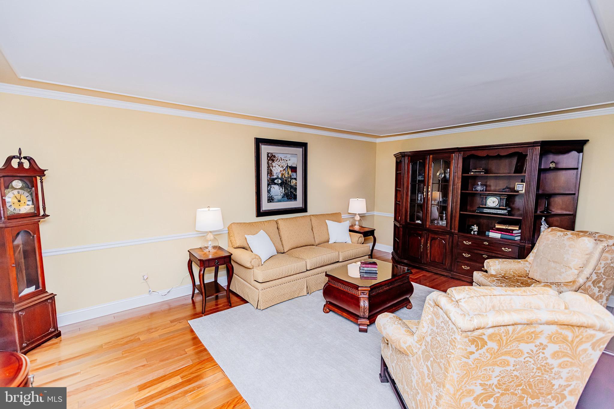 680 Fox Hollow Drive Yardley, PA 19067 - Photo 5 of 63 a living room with furniture and a wooden floor
