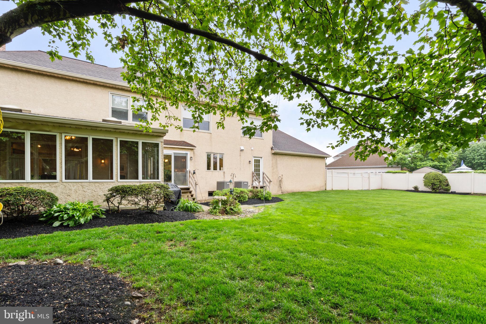 680 Fox Hollow Drive Yardley, PA 19067 - Photo 50 of 63 a front view of a house with a garden