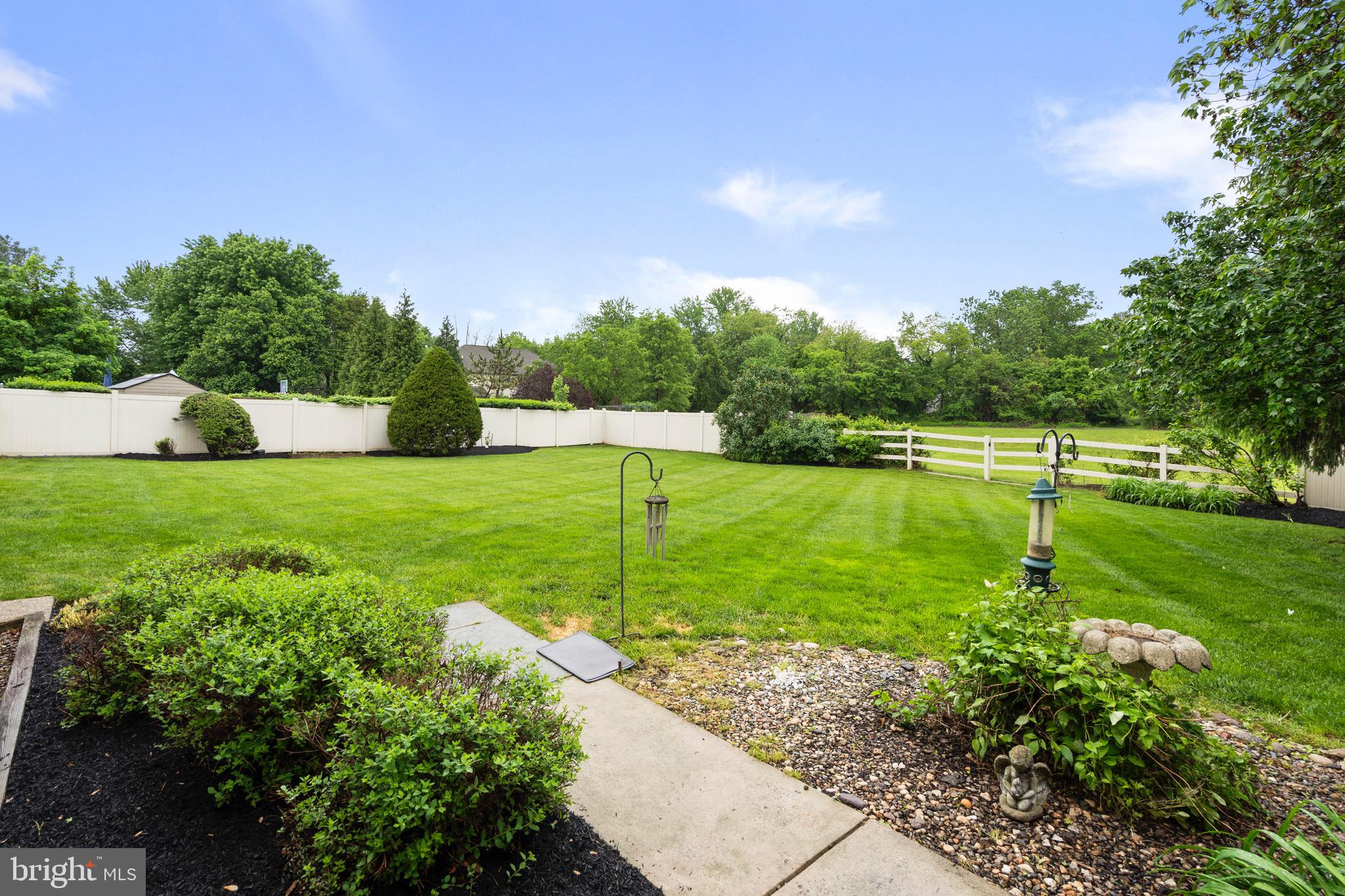 680 Fox Hollow Drive Yardley, PA 19067 - Photo 52 of 63 a view of a golf course with a lake view