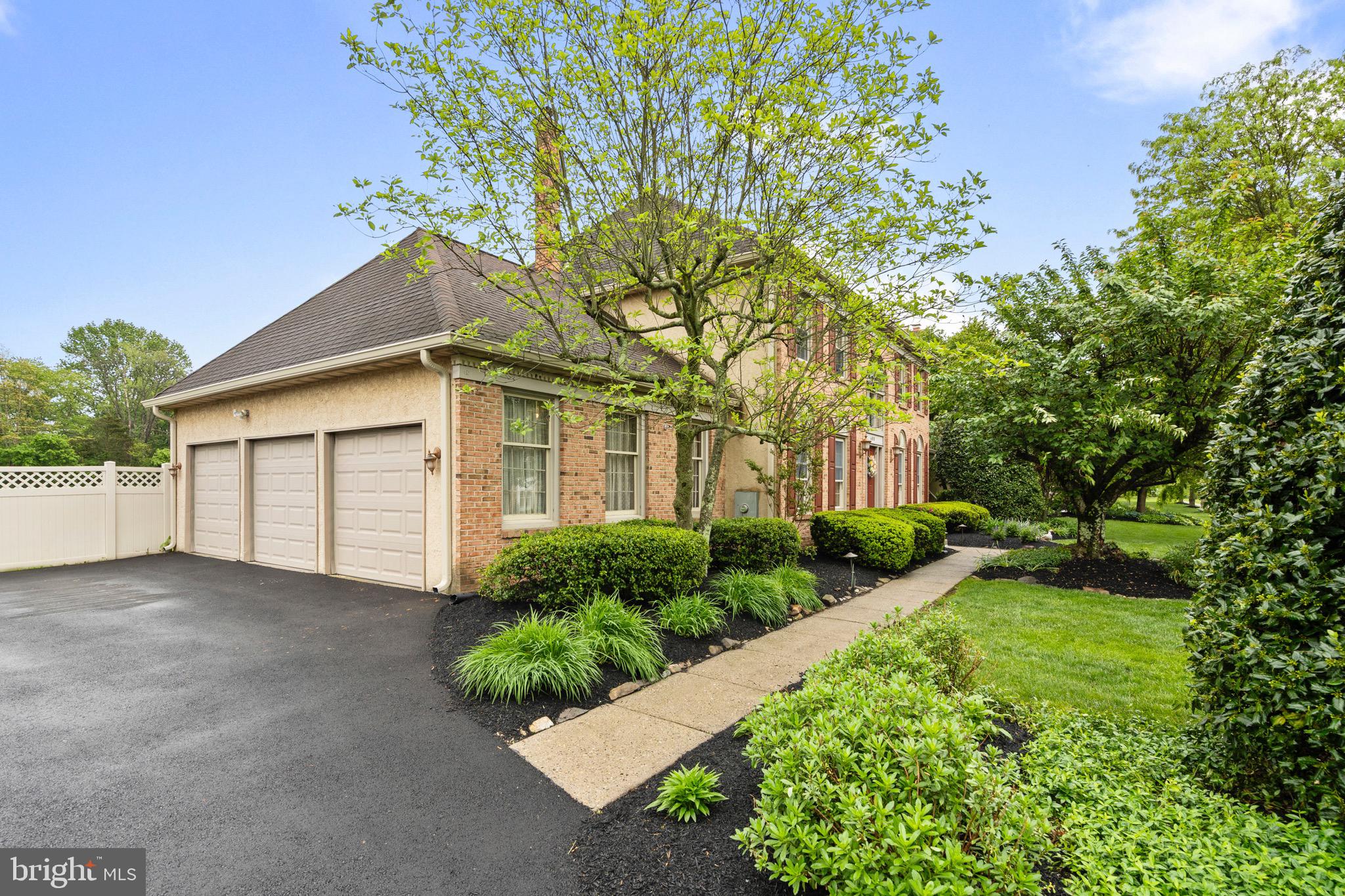 680 Fox Hollow Drive Yardley, PA 19067 - Photo 54 of 63 a front view of a house with garden