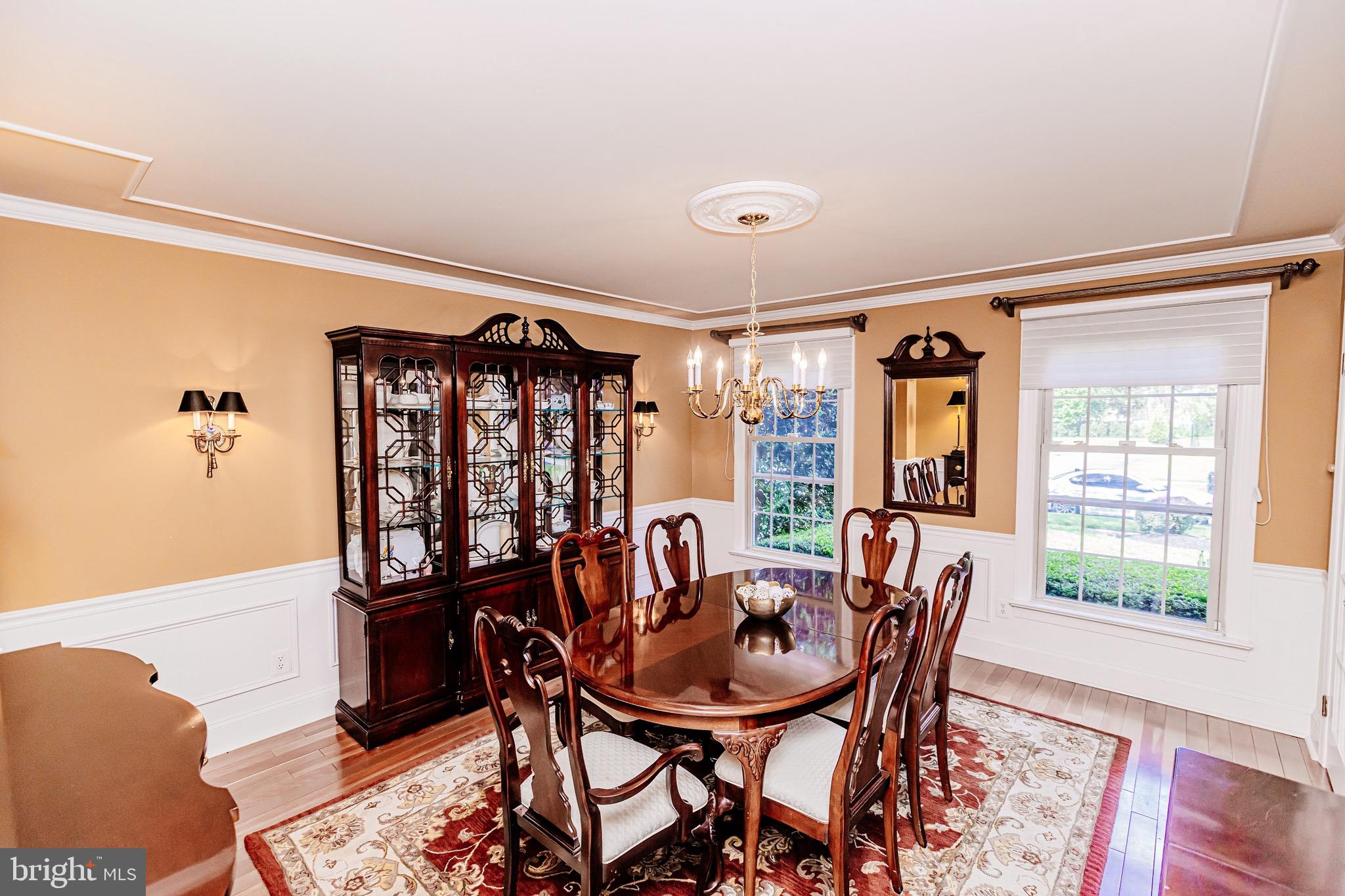 680 Fox Hollow Drive Yardley, PA 19067 - Photo 8 of 63 a view of a dining room with furniture and wooden floor