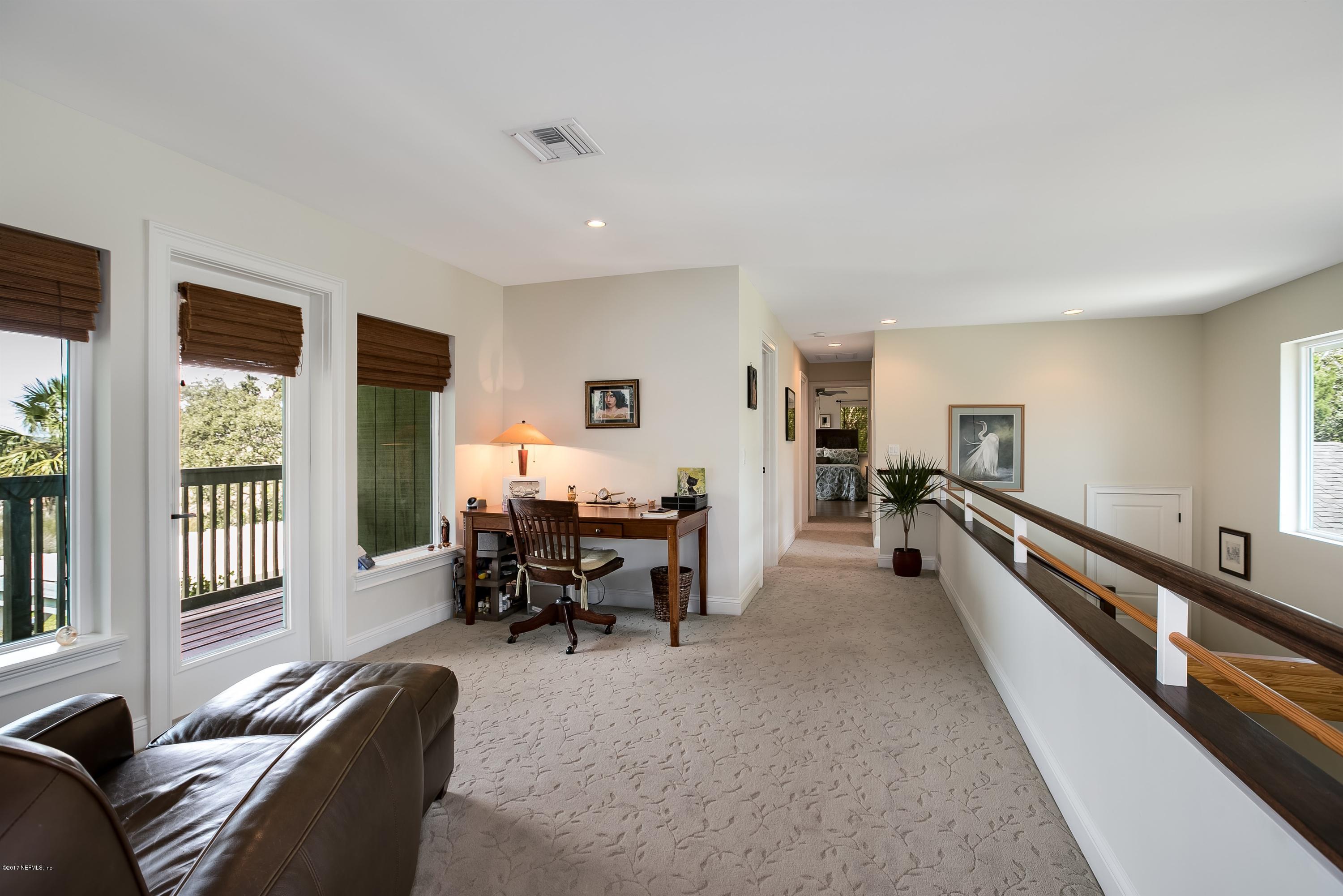 1507 San Rafael Way St. Augustine, FL 32080 - Photo 16 of 32 a living room with furniture and a table