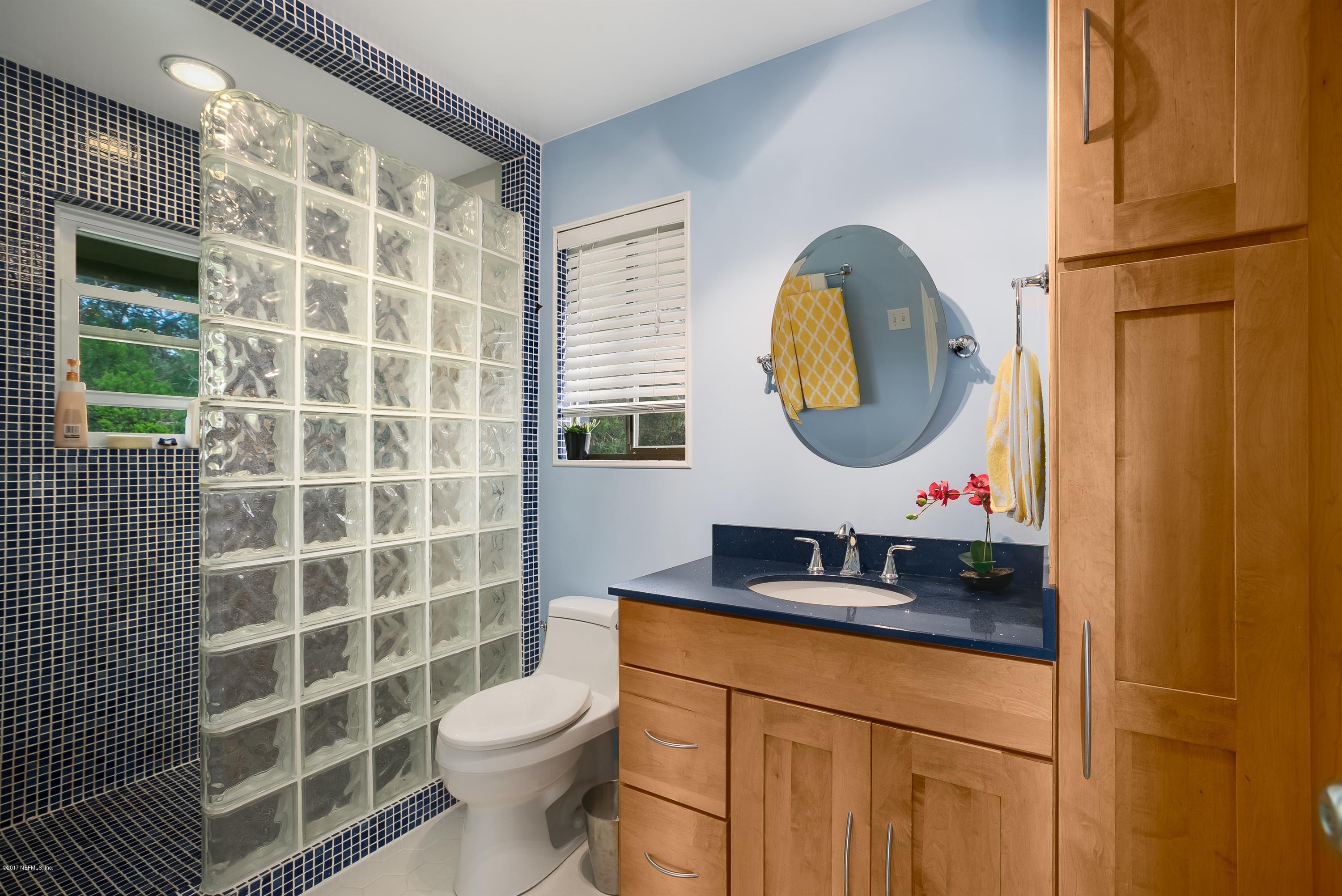 1507 San Rafael Way St. Augustine, FL 32080 - Photo 20 of 32 a bathroom with a sink toilet and a shower