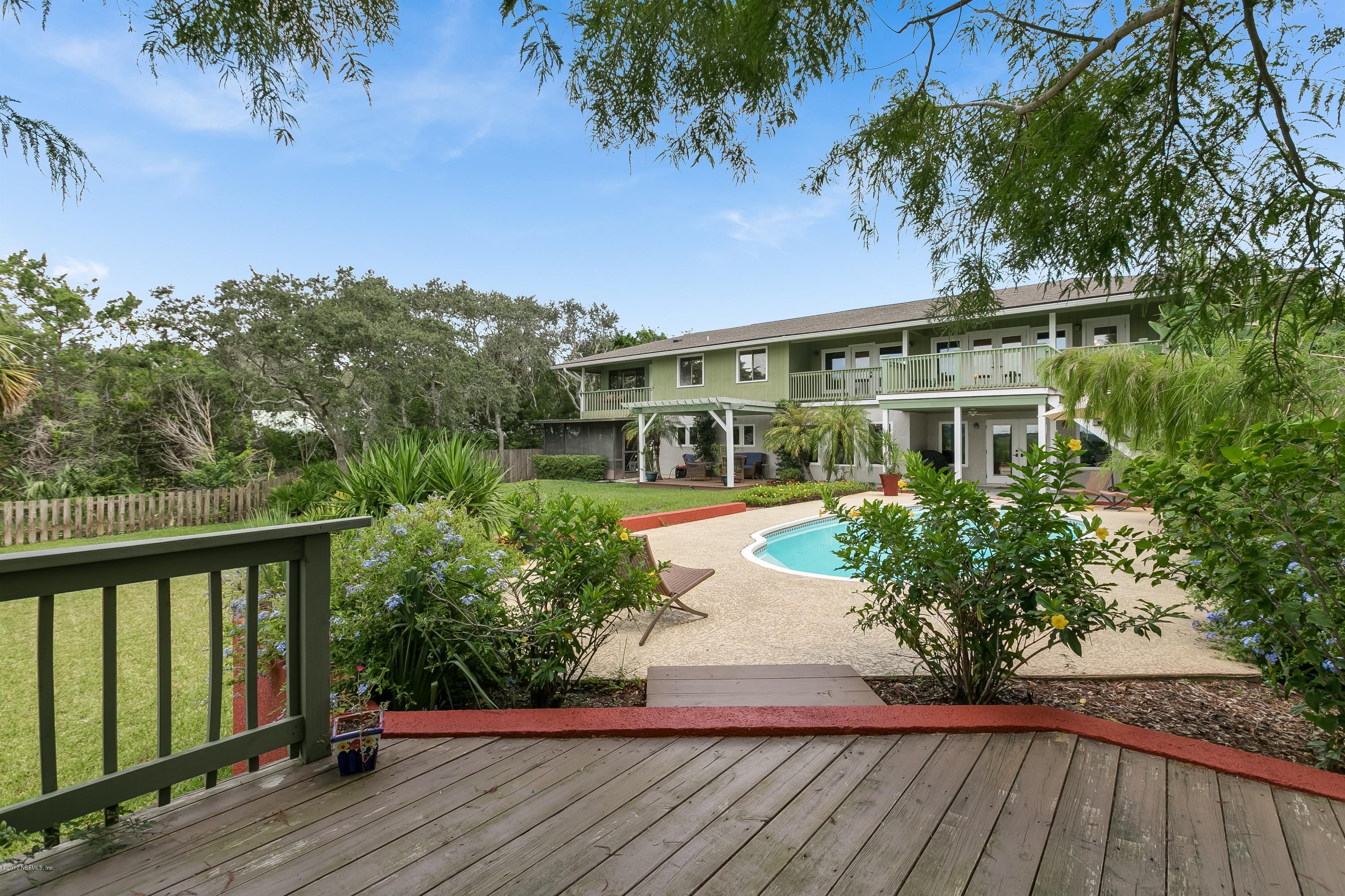 1507 San Rafael Way St. Augustine, FL 32080 - Photo 25 of 32 a front view of a house with a yard