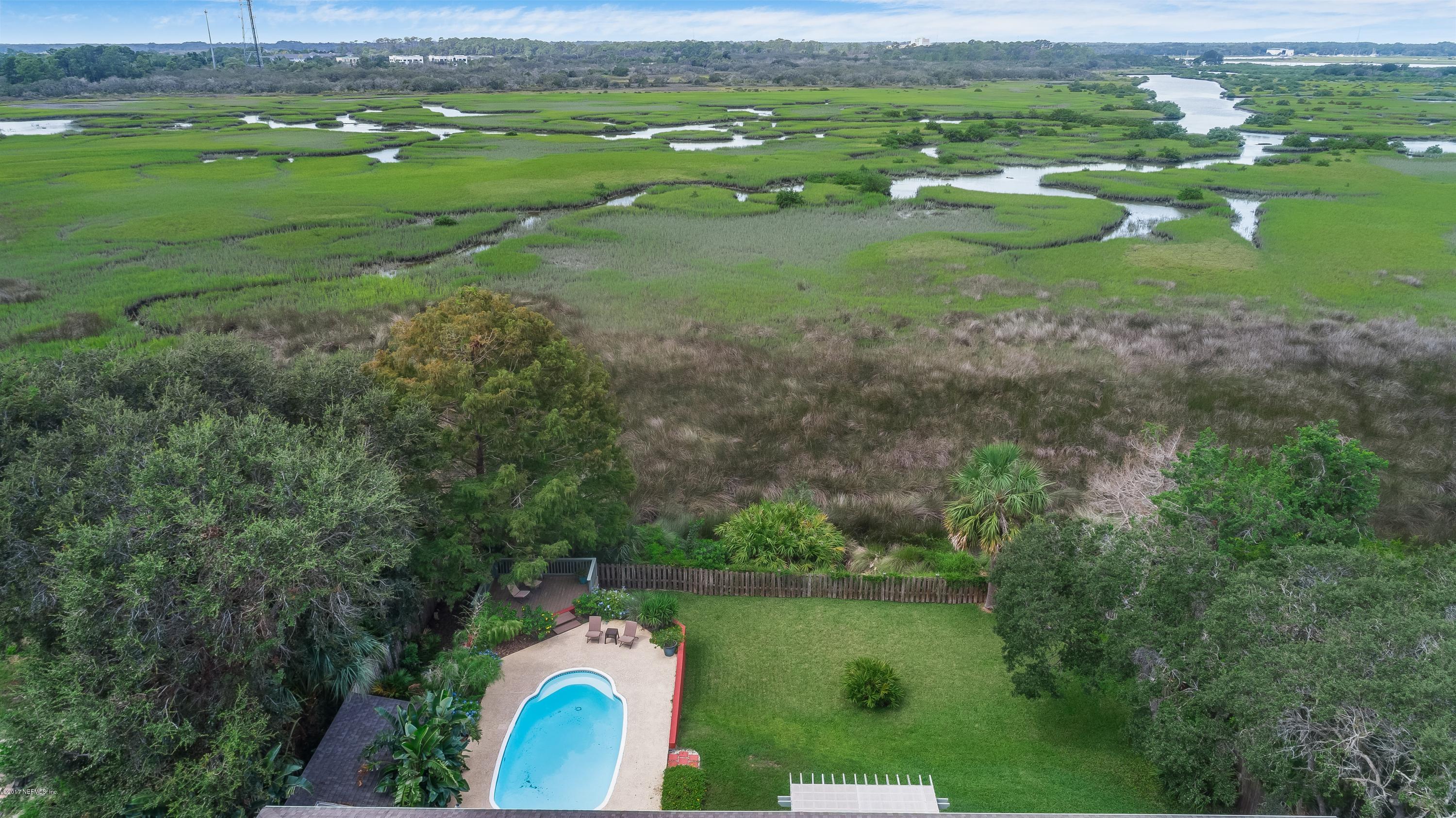 1507 San Rafael Way St. Augustine, FL 32080 - Photo 28 of 32 a view of a lake with a houses