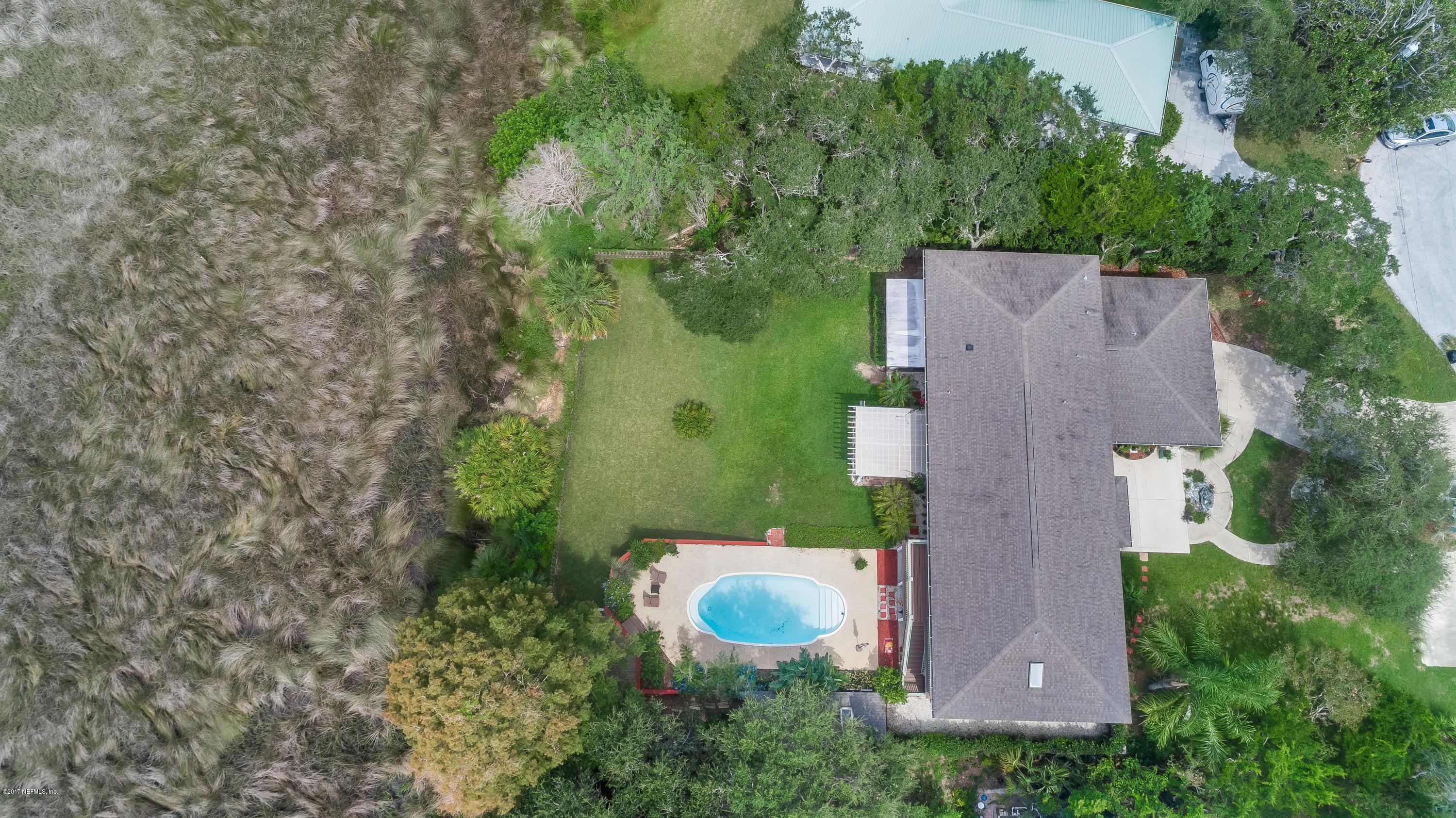 1507 San Rafael Way St. Augustine, FL 32080 - Photo 32 of 32 an aerial view of a house with a yard
