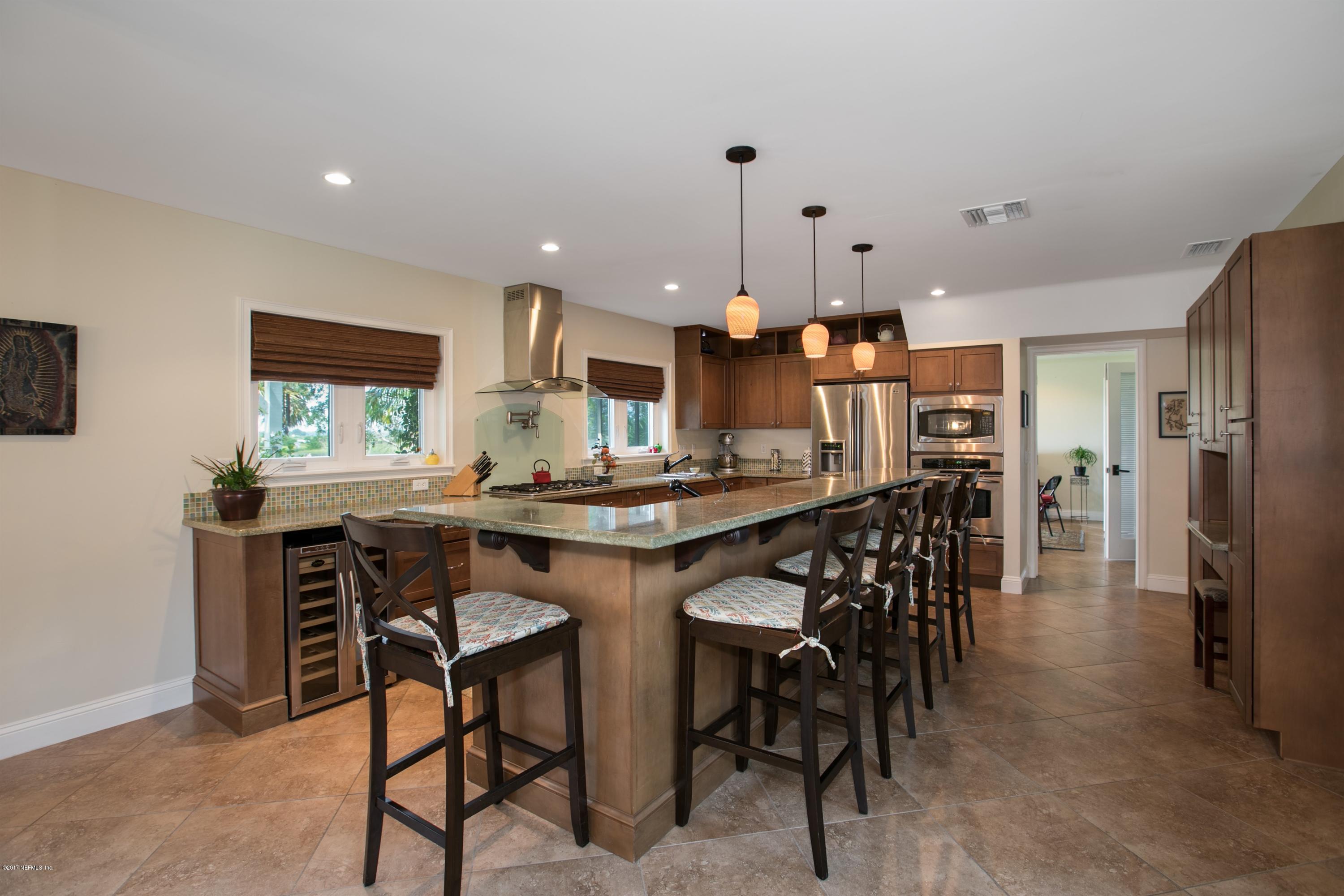 1507 San Rafael Way St. Augustine, FL 32080 - Photo 5 of 32 a kitchen with a table and chairs in it