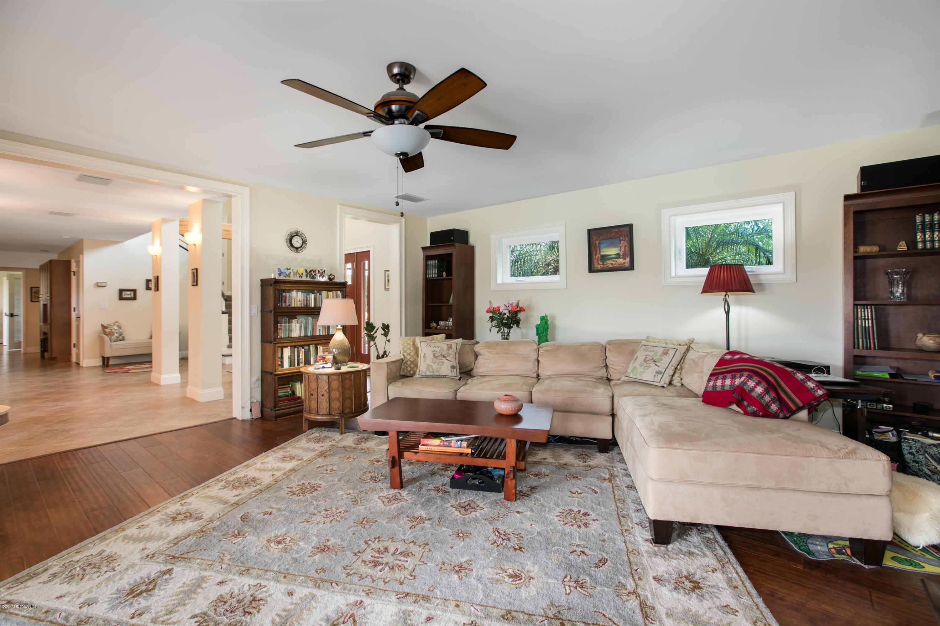 1507 San Rafael Way St. Augustine, FL 32080 - Photo 9 of 32 a living room with furniture and a wooden floor