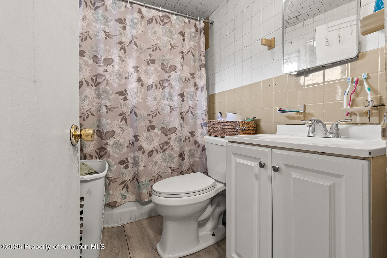 1406 North Main Avenue Scranton, PA 18508 - Photo 12 of 29 a bathroom with a sink toilet and mirror