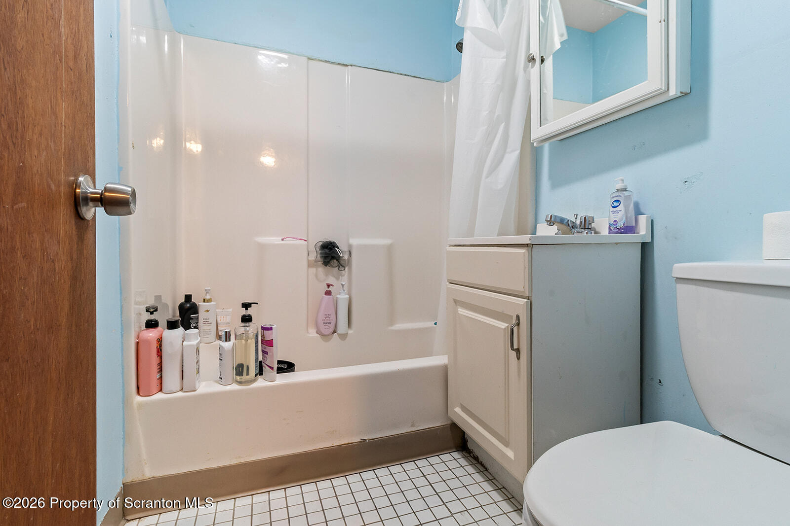 1406 North Main Avenue Scranton, PA 18508 - Photo 13 of 29 a bathroom with a sink a toilet and shower