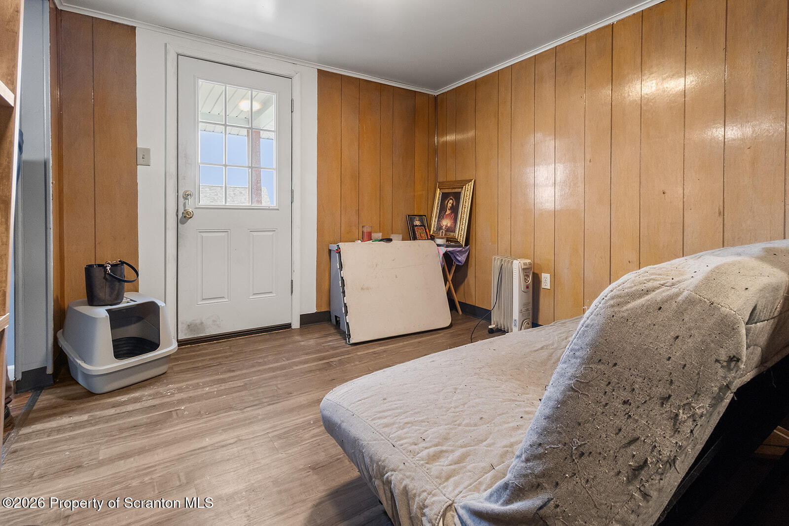 1406 North Main Avenue Scranton, PA 18508 - Photo 16 of 29 a spacious bedroom with a bed and a cabinets