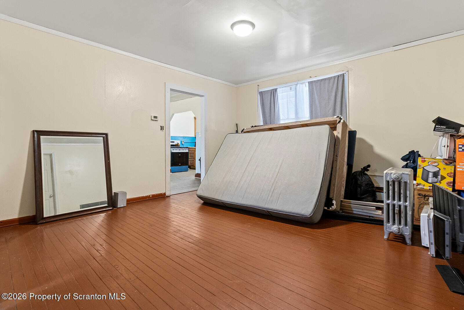 1406 North Main Avenue Scranton, PA 18508 - Photo 21 of 29 a bed room with wooden floor and a window