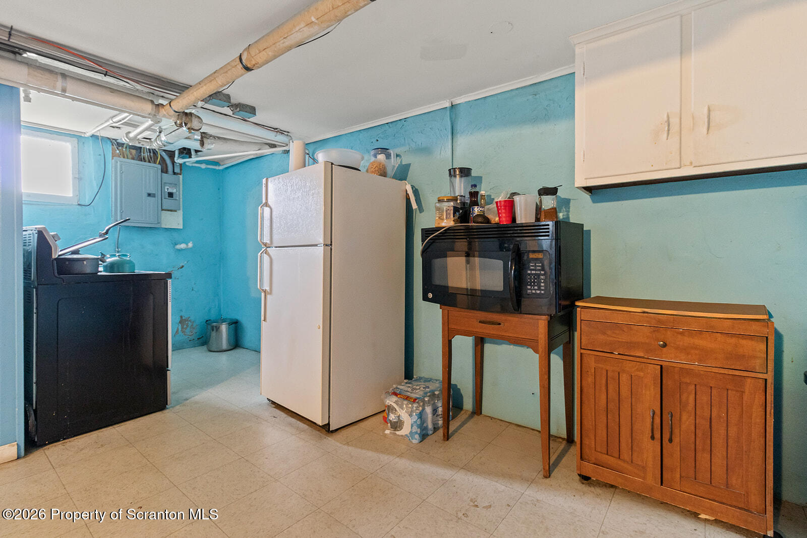 1406 North Main Avenue Scranton, PA 18508 - Photo 22 of 29 a kitchen with stainless steel appliances a refrigerator and a refrigerator