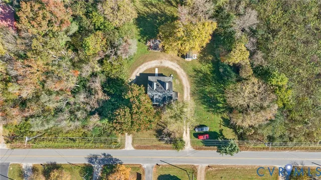 a bedroom with furniture and a baby crib