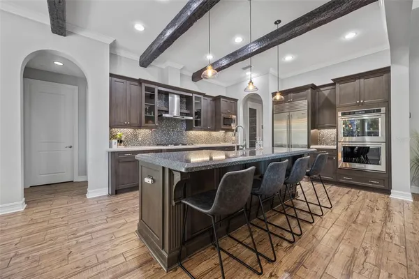 a utility room with sink dryer and washer