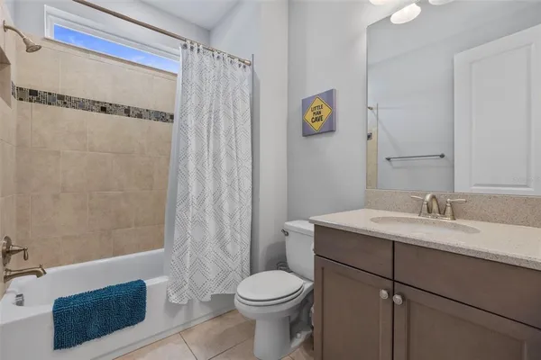 an aerial view of a house with a swimming pool