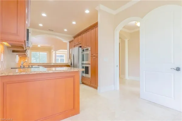 a view of a kitchen with a sink