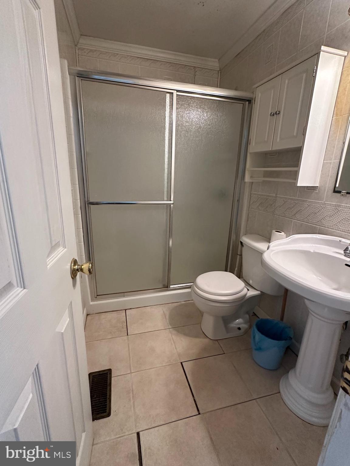 21125 Bay Berry Road Tylerton, MD 21866 - Photo 12 of 20 a bathroom with a toilet and a shower