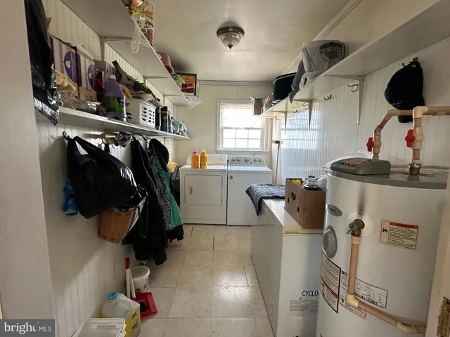 a view of a kitchen and utility room