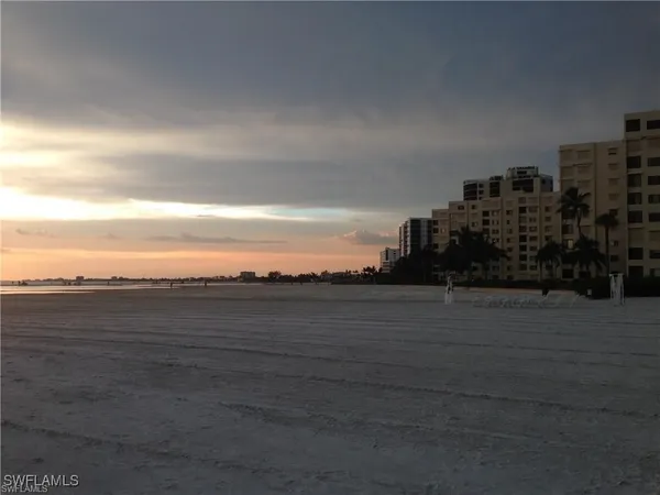 a view of a lake and a yard
