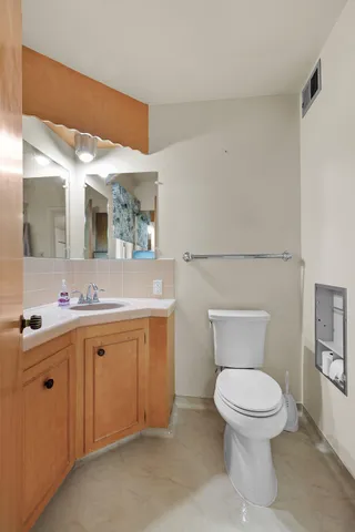 a view of kitchen with furniture and a window