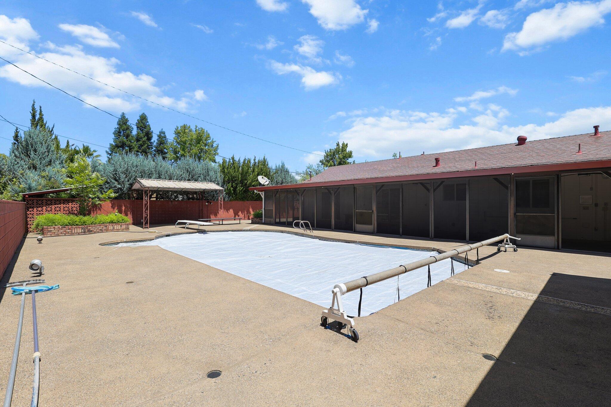 910 Hallmark Drive Redding, CA 96001 - Photo 28 of 40 a swimming pool with a outdoor space