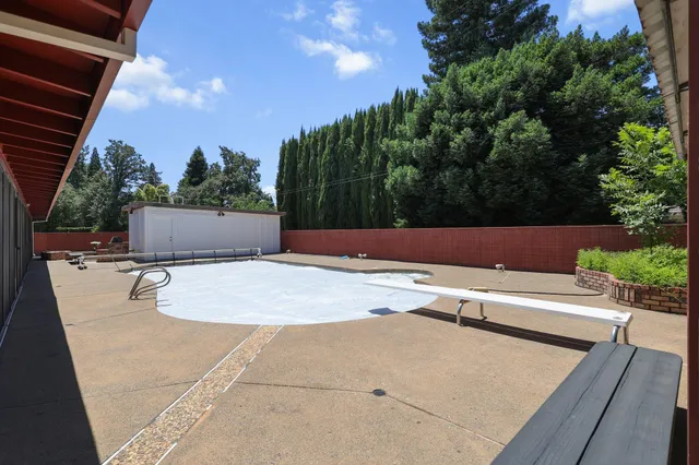 a backyard of a house with seating space