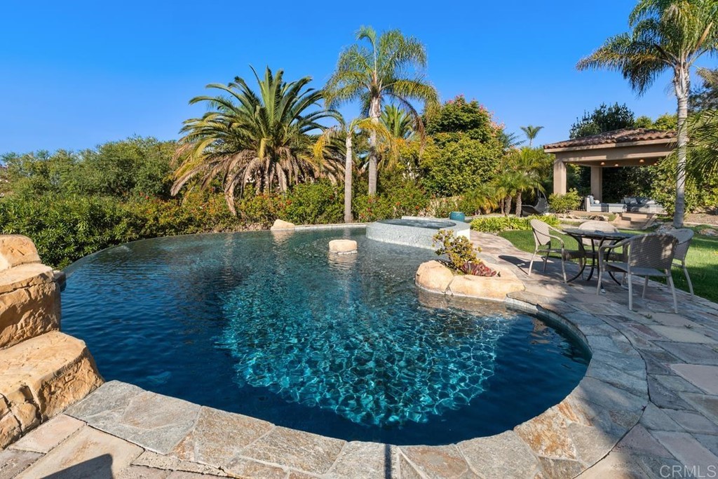 1620 Bella Vista Drive Encinitas, CA 92024 - Photo 29 of 35 a view of a swimming pool with a patio