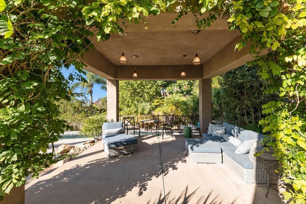 1620 Bella Vista Drive Encinitas, CA 92024 - Photo 34 of 35 a building outdoor space with patio furniture and garden view