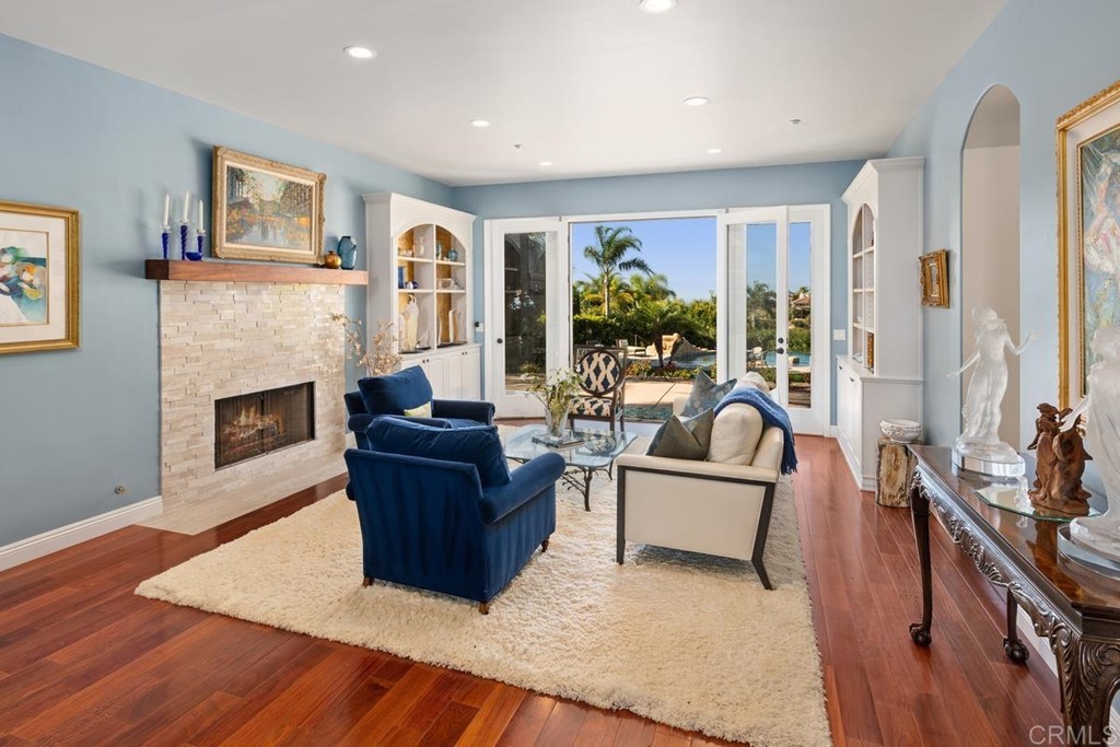 1620 Bella Vista Drive Encinitas, CA 92024 - Photo 7 of 35 a living room with furniture and a fireplace